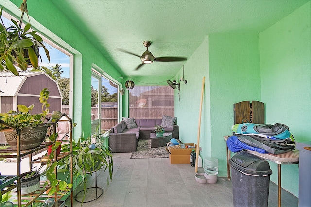 1037 SW Romaine Ln, Port Saint Lucie, FL 34953 - view of patio / terrace featuring ceiling fan, an outdoor hangout area, and a storage unit