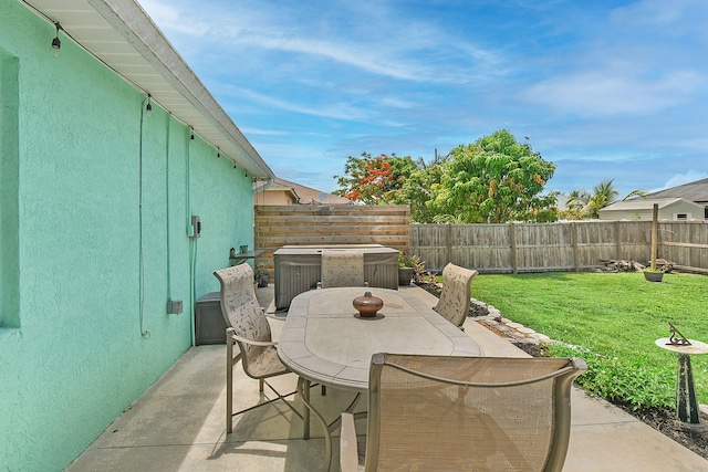 1037 SW Romaine Ln, Port Saint Lucie, FL 34953 - fenced backyard featuring a patio and outdoor dining area