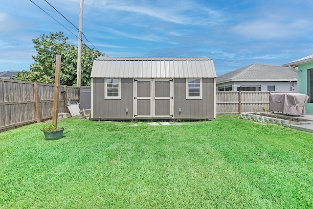 1037 SW Romaine Ln, Port Saint Lucie, FL 34953 - view of shed featuring a fenced backyard