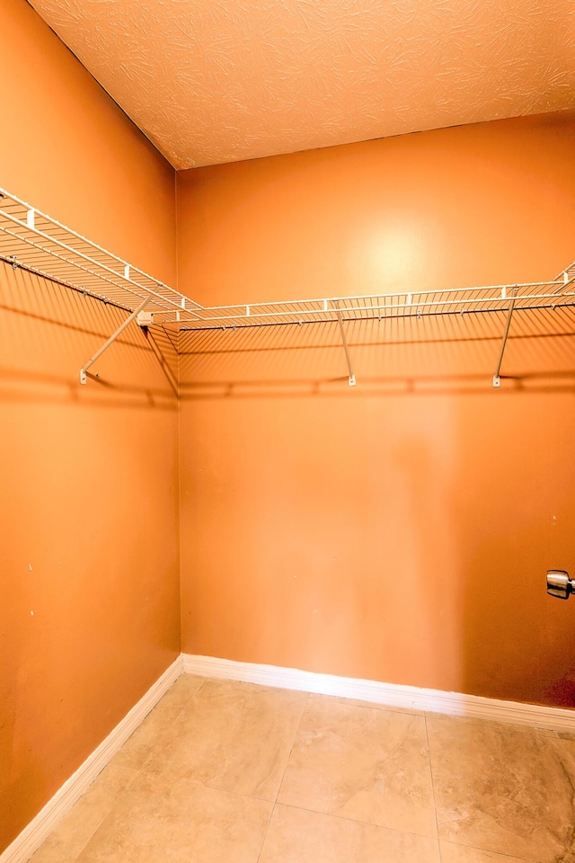 6545 SE Federal Hwy Unit 102, Stuart, FL 34997 - spacious closet with tile patterned flooring