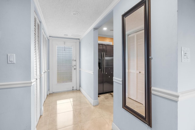 5961 NW 61st Ave Unit 203, Tamarac, FL 33319 - hallway featuring light tile patterned floors and a textured ceiling