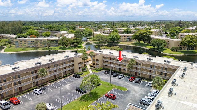 5961 NW 61st Ave Unit 203, Tamarac, FL 33319 - drone / aerial view of apartment complex / building and a large body of water