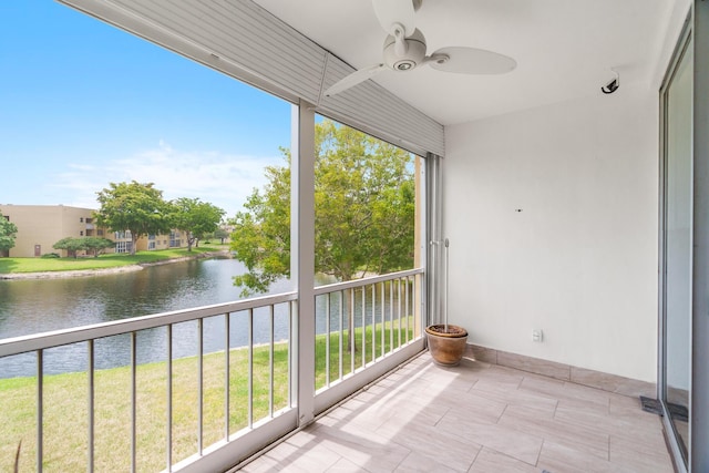 5961 NW 61st Ave Unit 203, Tamarac, FL 33319 - unfurnished sunroom featuring a water view and a ceiling fan