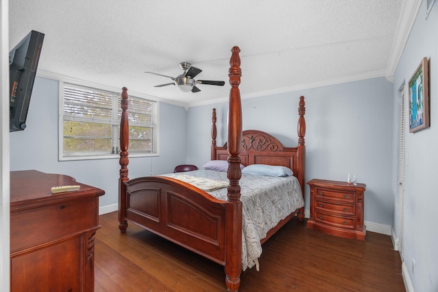 5961 NW 61st Ave Unit 203, Tamarac, FL 33319 - bedroom with dark wood finished floors, crown molding, ceiling fan, and a textured ceiling