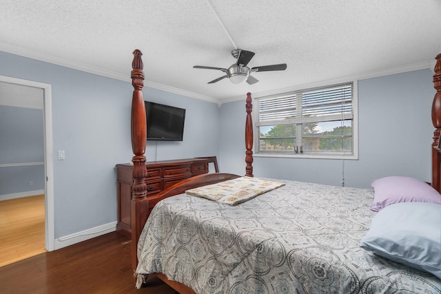 5961 NW 61st Ave Unit 203, Tamarac, FL 33319 - bedroom with wood finished floors, a textured ceiling, ornamental molding, and ceiling fan