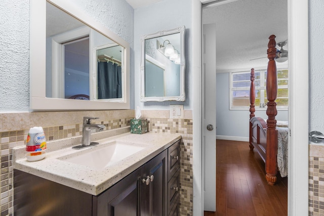 5961 NW 61st Ave Unit 203, Tamarac, FL 33319 - bathroom with vanity and hardwood / wood-style flooring