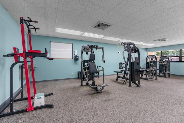5961 NW 61st Ave Unit 203, Tamarac, FL 33319 - exercise room featuring a paneled ceiling and carpet floors
