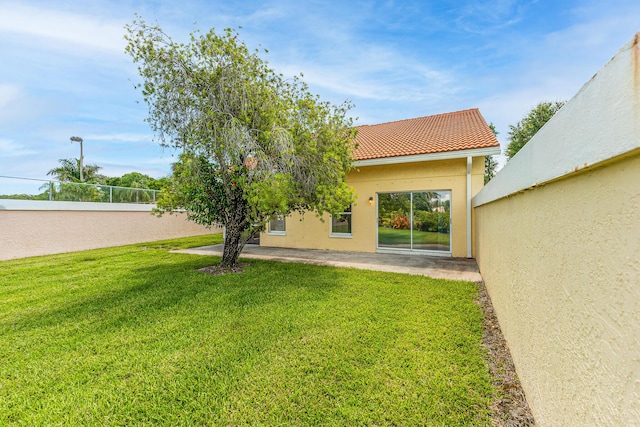 2322 SW Olympic Club Ter, Palm City, FL 34990 - view of yard featuring a patio