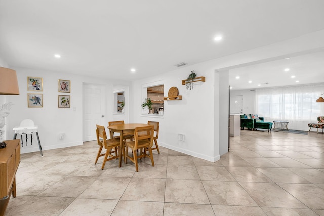 29 SE 8th Ave, Deerfield Beach, FL 33441 - dining space with recessed lighting and light tile patterned flooring