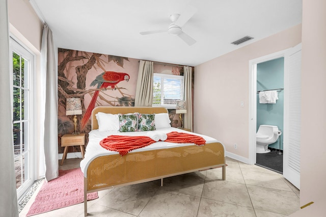 29 SE 8th Ave, Deerfield Beach, FL 33441 - tiled bedroom with ensuite bath and ceiling fan