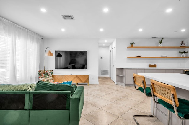 29 SE 8th Ave, Deerfield Beach, FL 33441 - living room featuring light tile patterned flooring and recessed lighting