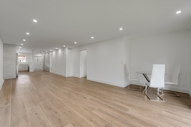 2845 SW 22nd Ave Unit 2070, Delray Beach, FL 33445 - empty room with light wood-style flooring and recessed lighting