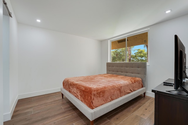 2845 SW 22nd Ave Unit 2070, Delray Beach, FL 33445 - bedroom featuring wood finished floors and recessed lighting