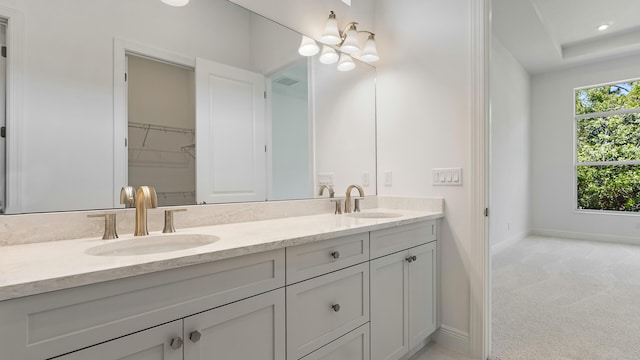 204 SE Via Sangro, Port Saint Lucie, FL 34952 - bathroom with double vanity and a walk in closet