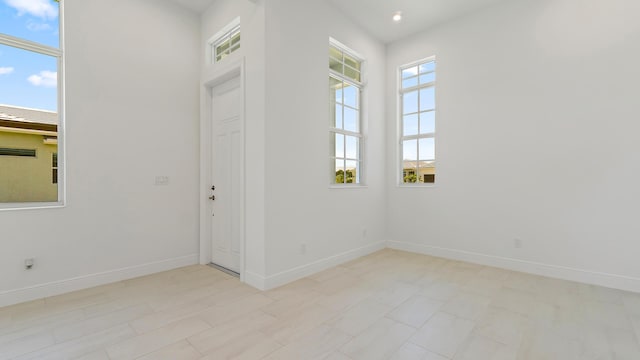 204 SE Via Sangro, Port Saint Lucie, FL 34952 - spare room featuring baseboards and recessed lighting