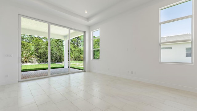 204 SE Via Sangro, Port Saint Lucie, FL 34952 - empty room with baseboards and light tile patterned flooring