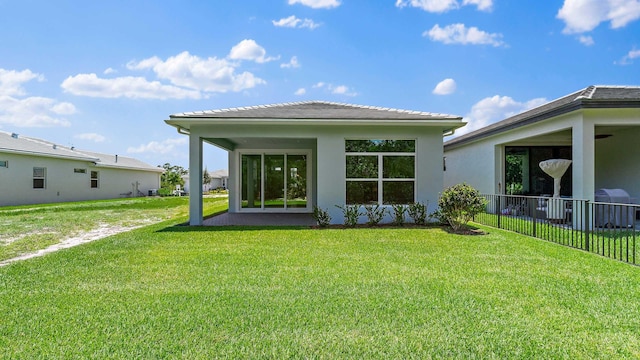 204 SE Via Sangro, Port Saint Lucie, FL 34952 - rear view of property with stucco siding
