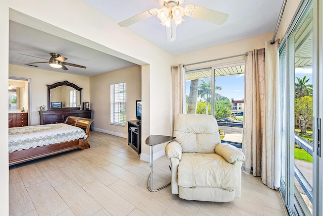 5560 Tamberlane Cir Unit 327, Palm Beach Gardens, FL 33418 - bedroom with access to outside and ceiling fan