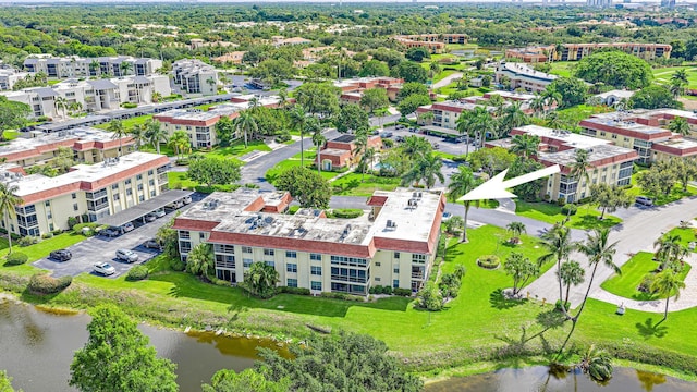 5560 Tamberlane Cir Unit 327, Palm Beach Gardens, FL 33418 - aerial view of apartment complex and a large body of water