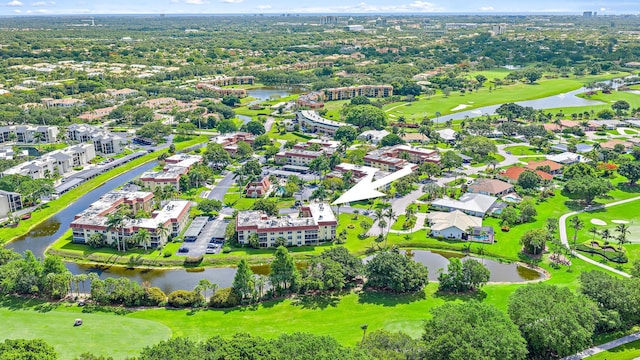 5560 Tamberlane Cir Unit 327, Palm Beach Gardens, FL 33418 - drone / aerial view of a nearby body of water and a golf course