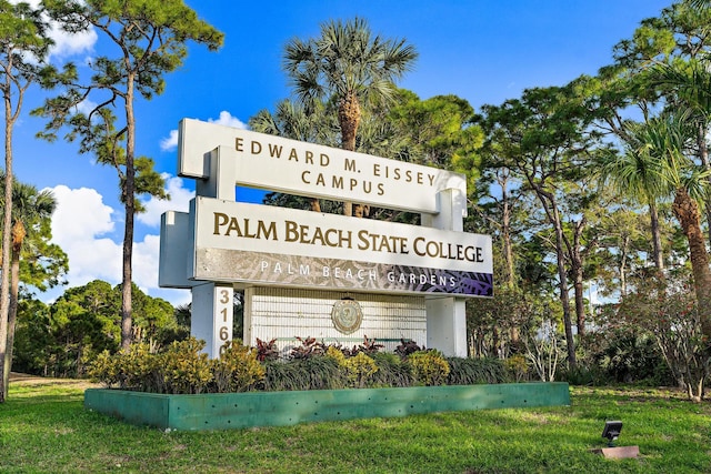 5560 Tamberlane Cir Unit 327, Palm Beach Gardens, FL 33418 - community / neighborhood sign featuring a lawn