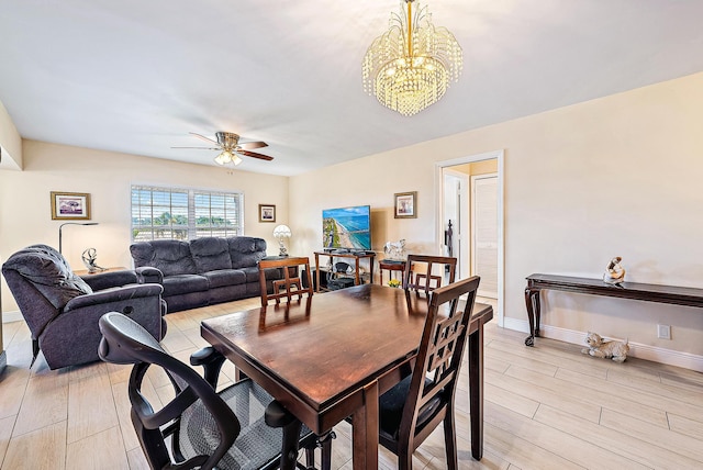 5560 Tamberlane Cir Unit 327, Palm Beach Gardens, FL 33418 - dining room with ceiling fan, light wood-type flooring, and a chandelier