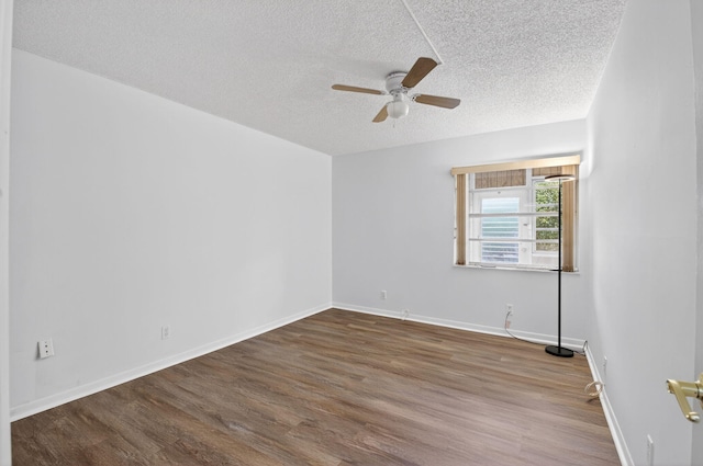 102 Normandy Ln Unit C, Delray Beach, FL 33484 - spare room with ceiling fan, wood finished floors, and a textured ceiling
