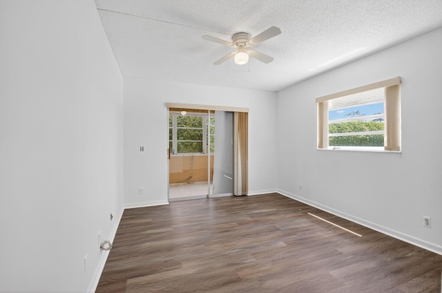 102 Normandy Ln Unit C, Delray Beach, FL 33484 - empty room featuring a ceiling fan, a textured ceiling, and wood finished floors