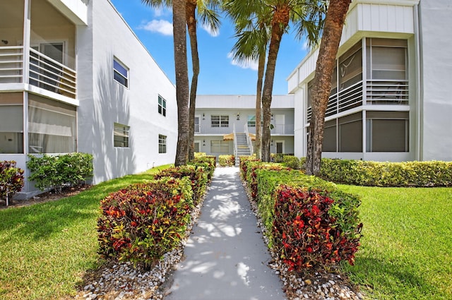 102 Normandy Ln Unit C, Delray Beach, FL 33484 - view of home's community with a lawn