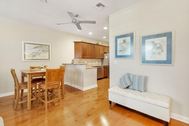 3330 W Mallory Blvd, Jupiter, FL 33458 - dining space featuring light wood-style flooring, ceiling fan, and recessed lighting