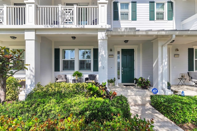 3330 W Mallory Blvd, Jupiter, FL 33458 - property entrance featuring a porch and a balcony