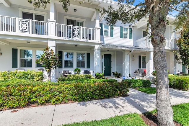 3330 W Mallory Blvd, Jupiter, FL 33458 - townhome / multi-family property with a balcony
