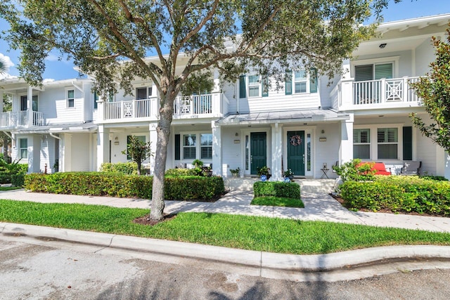 3330 W Mallory Blvd, Jupiter, FL 33458 - townhome / multi-family property with a standing seam roof