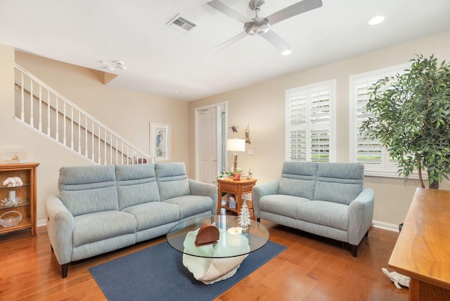 3330 W Mallory Blvd, Jupiter, FL 33458 - living area featuring wood finished floors, a ceiling fan, recessed lighting, and stairs