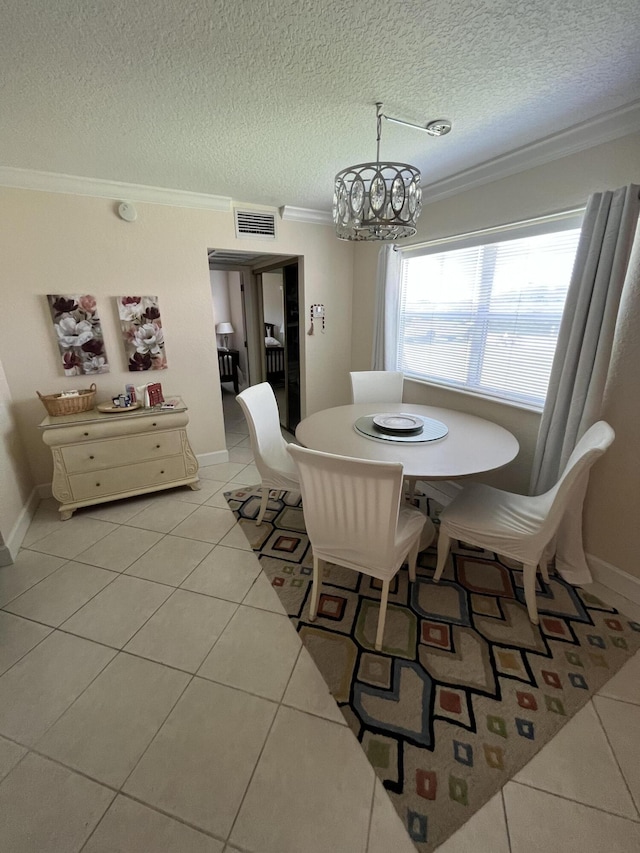 291 Saxony Unit G, Delray Beach, FL 33446 - dining space with crown molding, light tile patterned floors, a chandelier, and a textured ceiling