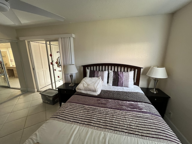 291 Saxony Unit G, Delray Beach, FL 33446 - bedroom featuring tile patterned floors and a closet