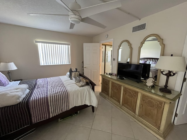 291 Saxony Unit G, Delray Beach, FL 33446 - bedroom featuring light tile patterned floors and ceiling fan