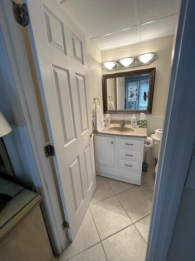 291 Saxony Unit G, Delray Beach, FL 33446 - bathroom featuring tile patterned floors and vanity