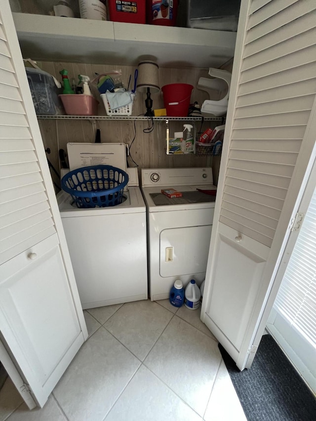 291 Saxony Unit G, Delray Beach, FL 33446 - laundry room with washing machine and clothes dryer and light tile patterned flooring