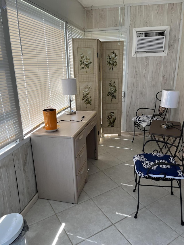 291 Saxony Unit G, Delray Beach, FL 33446 - office space featuring a wall unit AC, light tile patterned floors, and wooden walls