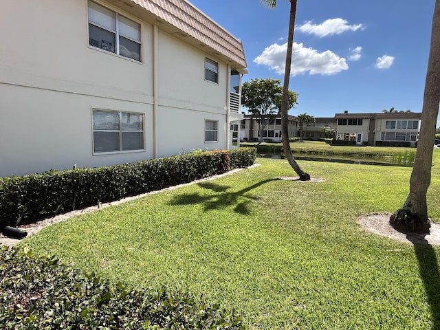 291 Saxony Unit G, Delray Beach, FL 33446 - view of grassy yard with a water view