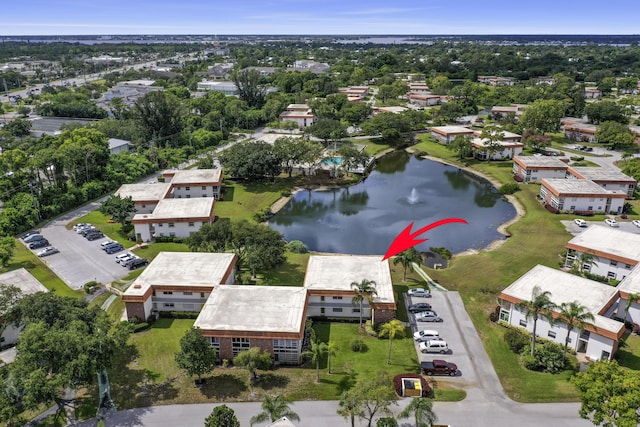 1225 NW 21st St Unit 3701, Stuart, FL 34994 - aerial view of property and surrounding area featuring a nearby body of water