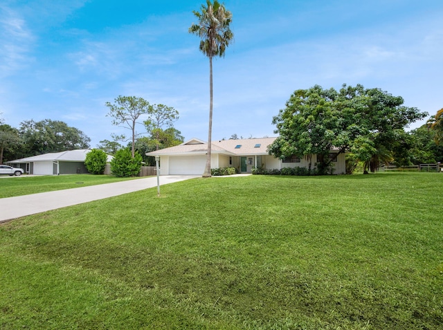 1680 SW Belgrave Ter, Stuart, FL 34997 - ranch-style home featuring concrete driveway, an attached garage, and a front yard