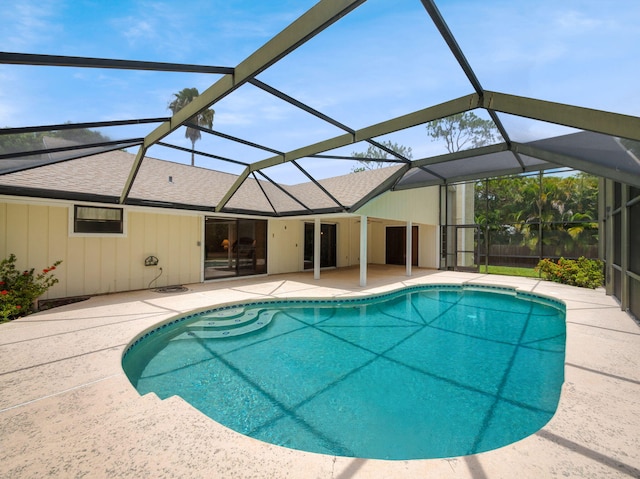 1680 SW Belgrave Ter, Stuart, FL 34997 - swimming pool with a patio and a lanai