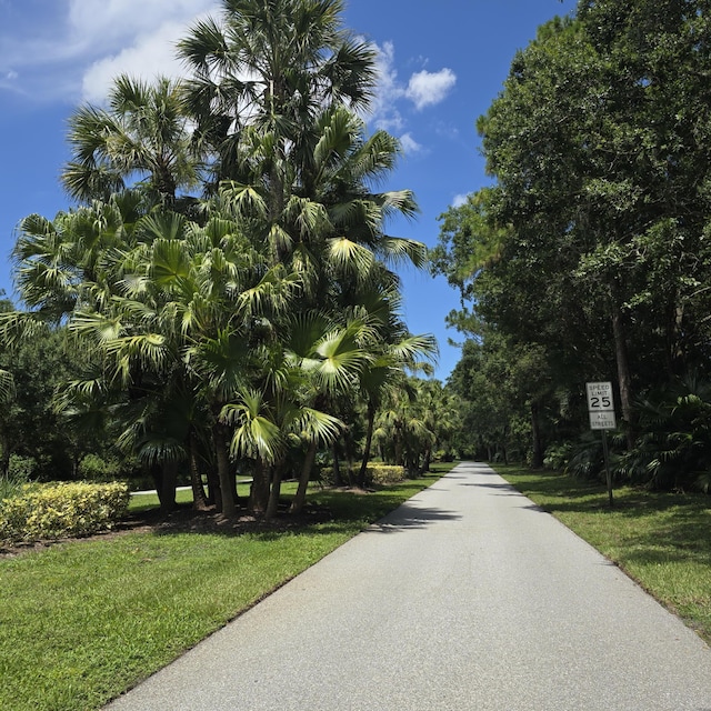 1680 SW Belgrave Ter, Stuart, FL 34997 - view of street with traffic signs