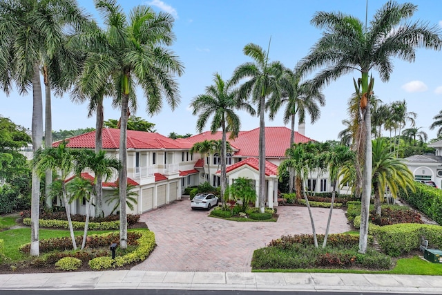3643 Princeton Pl, Boca Raton, FL 33496 - mediterranean / spanish-style house with decorative driveway, a tile roof, a garage, and stucco siding