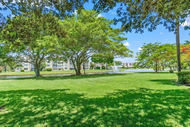 14721 Bonaire Blvd Unit 101, Delray Beach, FL 33446 - view of home's community with a yard and a water view