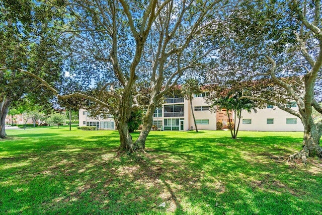 14721 Bonaire Blvd Unit 101, Delray Beach, FL 33446 - view of green lawn