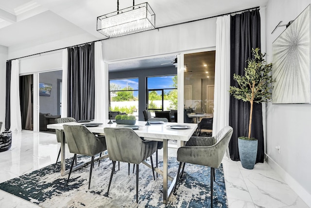 5476 NW Cambo Ct, Port Saint Lucie, FL 34986 - dining area with marble finish flooring and baseboards