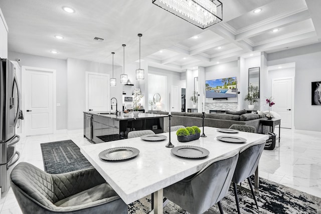 5476 NW Cambo Ct, Port Saint Lucie, FL 34986 - dining room featuring light marble finish flooring, recessed lighting, beamed ceiling, ornamental molding, and coffered ceiling